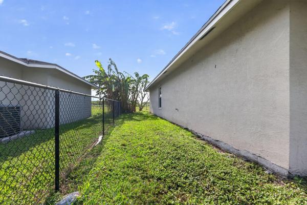 Hillsboro Estates, 138 Dabou Loop, Belle Glade, Florida 33430, image 1