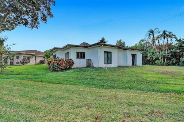 The Woodlands, 4808 Queen Palm Ln, Tamarac, Florida 33319, image 1