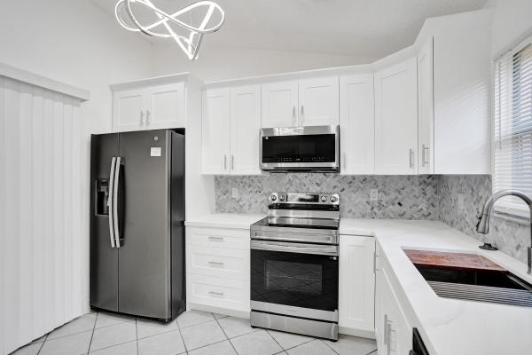 Caribe Isle At River Bridge, 133 Caribe Ct, Greenacres, Florida 33413, image 3