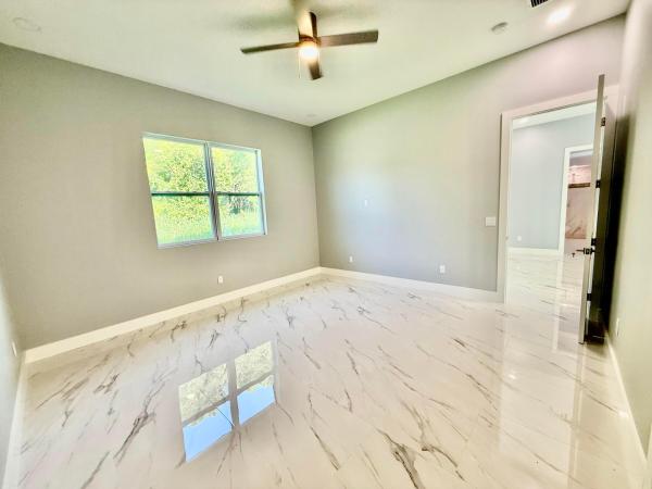 Moss Rose Place, 660 NE Moss Rose Pl, Port St. Lucie, Florida 34983, image 1