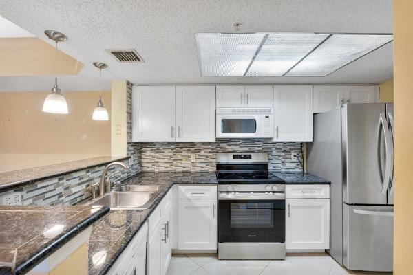 5011 Wiles Rd #303, Coconut Creek, Florida 33073, image 3