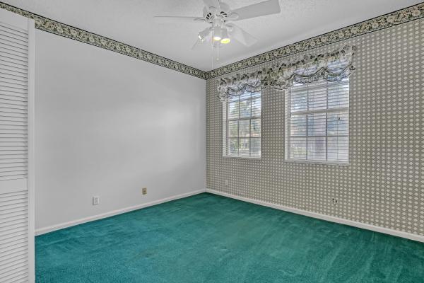 Caribe Isle At River Bridge, 180 Caribe Ct, Greenacres, Florida 33413, image 1