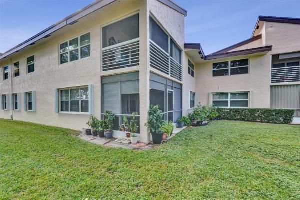 Azalea Court At Woodmont, 8740 Azalea Ct #102, Tamarac, Florida 33321, image 1