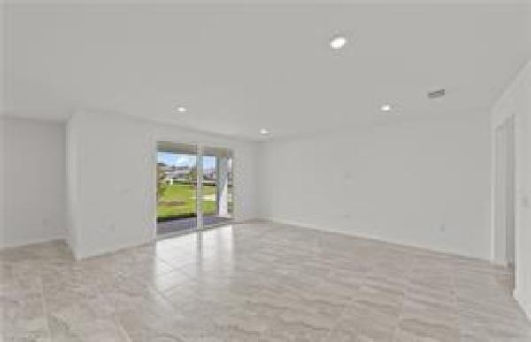 Whispering Lakes, 616 Oasis Lake Pl, Lehigh Acres, Florida 33936, image 2