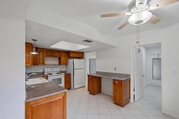The Woodlands, 4704 Queen Palm Ln, Tamarac, Florida 33319, image 1