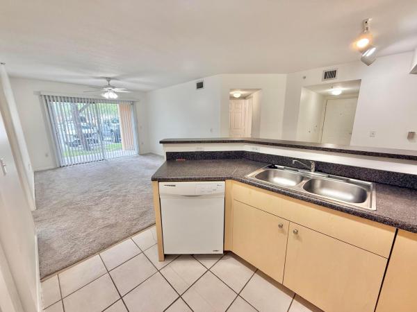 Emerald Isle At Laguna Lakes, 4200 San Marino Blvd #107, West Palm Beach, Florida 33409, image 2