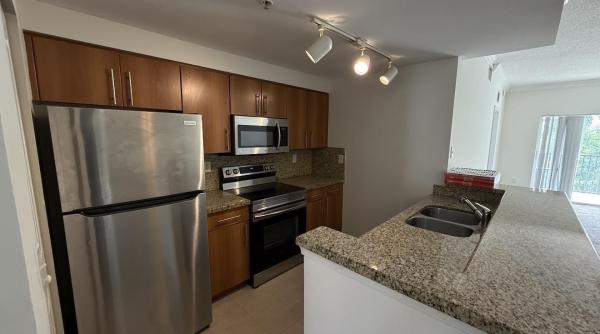 Poinciana Place, 5800 W Sample Rd #307, Coral Springs, Florida 33067, image 3