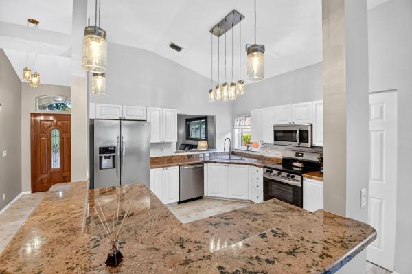 Hacienda At Woodbine, 8021 Via Hacienda, Riviera Beach, Florida 33418, image 2