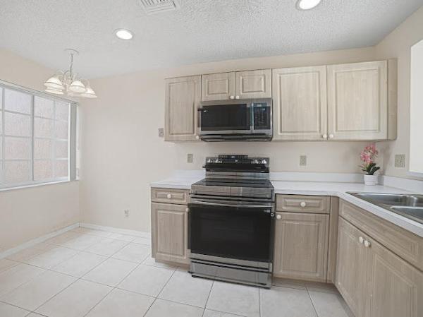 Shangri-La At Woodmont, 8596 Jade Dr, Tamarac, Florida 33321, image 1