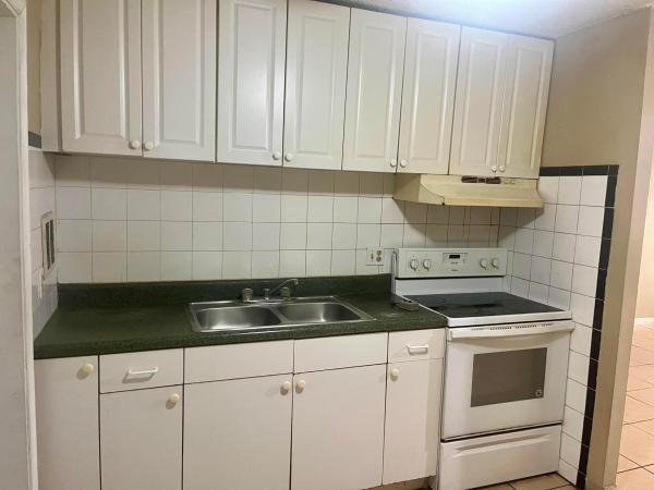 The Courtyards At Cimarron, 850 E Commercial Blvd #223C, Oakland Park, Florida 33334, image 1
