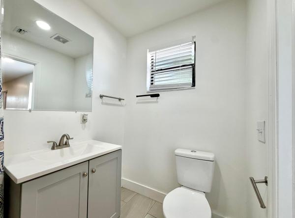 Esquire Lake Estates, 661 NW 23rd Ter, Pompano Beach, Florida 33069, image 2