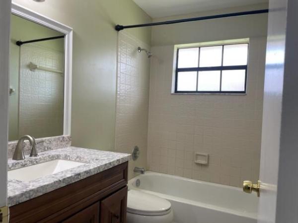 Westchester Townhouses, 4405 Woodstock Dr #D, West Palm Beach, Florida 33409, image 1