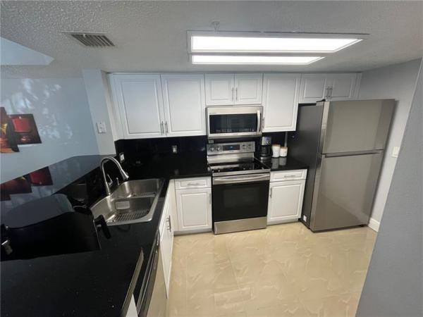 5051 Wiles Rd #207, Coconut Creek, Florida 33073, image 2
