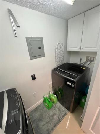 5051 Wiles Rd #207, Coconut Creek, Florida 33073, image 1