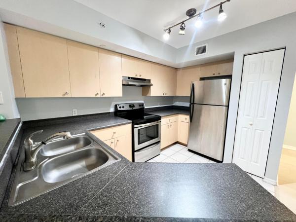 Emerald Isle At Laguna Lakes, 4021 San Marino Blvd #202, West Palm Beach, Florida 33409, image 1