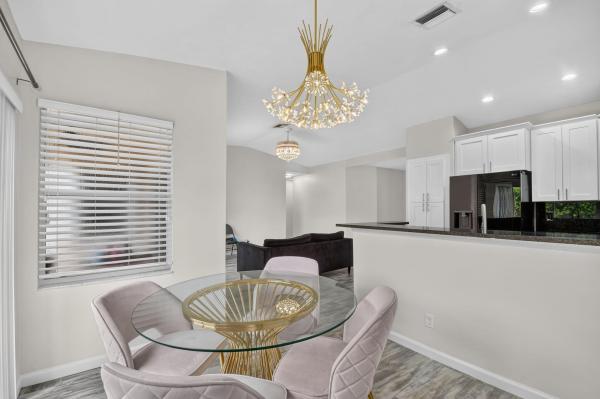 Caribe Isle At River Bridge, 208 Caribe Ct, Greenacres, Florida 33413, image 1