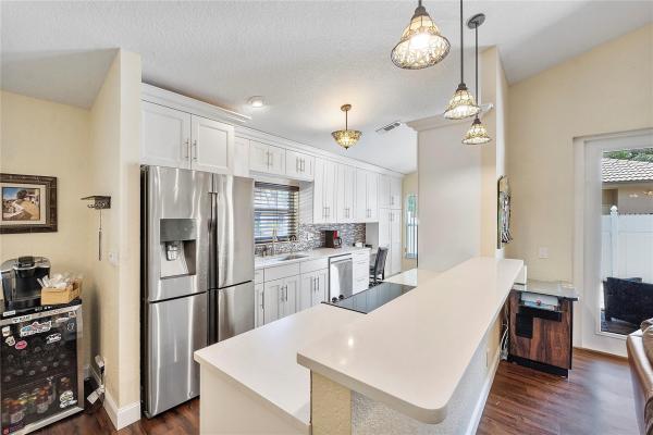 Mill Run Carriage Homes At Terramar, 6150 NW 76th Ct, Parkland, Florida 33067, image 2