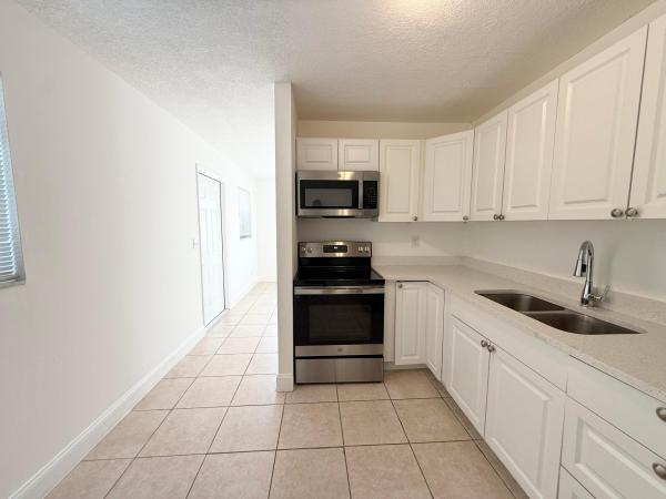 Kelsey City, 906 Foresteria Dr, Lake Park, Florida 33403, image 2