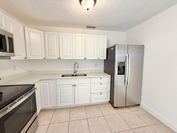 Kelsey City, 906 Foresteria Dr, Lake Park, Florida 33403, image 3