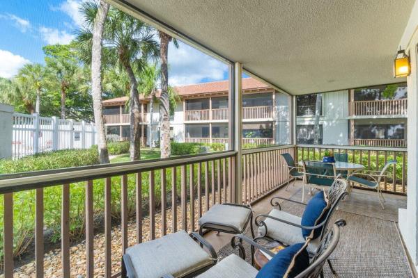 Golf Villas, 401 Brackenwood Ln S, Palm Beach Gardens, Florida 33418, image 1