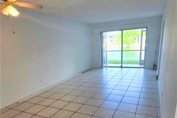 Versailles Gardens, 7801 Colony Cir S #106, Tamarac, Florida 33321, image 2