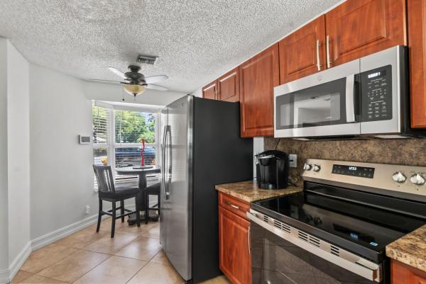 On The Greens, 7127 Woodmont Way, Tamarac, Florida 33321, image 1