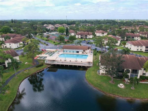 Pine Ridge South 3, 331 Knotty Pine Cir #C-1, Greenacres, Florida 33463, image 1