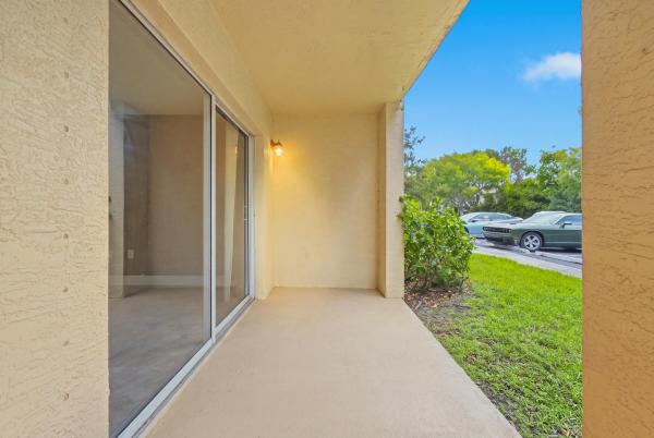 Emerald Isle At Laguna Lakes, 4041 San Marino Blvd #105, West Palm Beach, Florida 33409, image 1