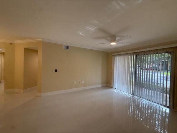 Emerald Isle At Laguna Lakes, 4280 San Marino Blvd #107, West Palm Beach, Florida 33409, image 1
