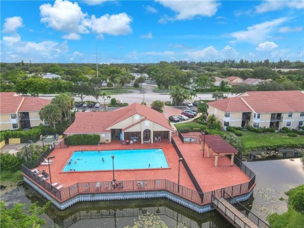 The Grand Oasis, 5681 Riverside Dr #101A6, Coral Springs, Florida 33067, image 1