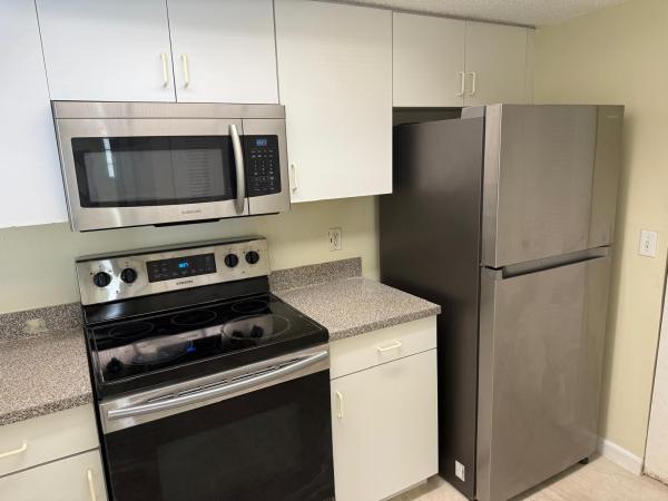 5061 Wiles Rd #202, Coconut Creek, Florida 33073, image 1