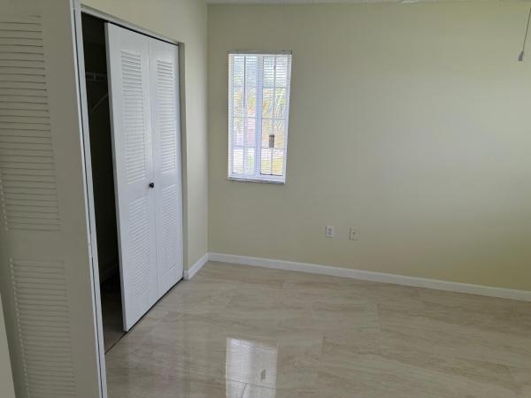 5061 Wiles Rd #202, Coconut Creek, Florida 33073, image 1