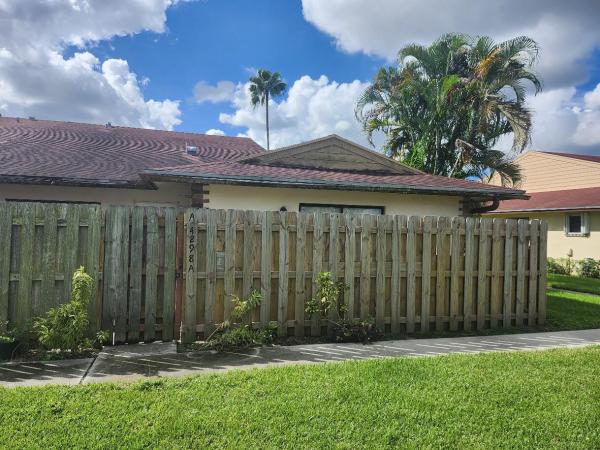 Westchester Townhouses, 4298 Woodstock Dr #A, West Palm Beach, Florida 33409, image 1