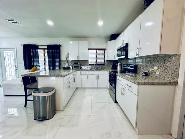 High House, 3041 NW 185th Ter, Miami Gardens, Florida 33056, image 1
