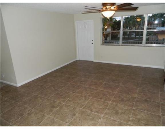 The Courtyards At Cimarron, 850 E Commercial Blvd #216B, Oakland Park, Florida 33334, image 1