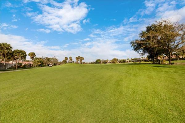 Villas On The Green, 590 Deer Creek Emerald Way E, Deerfield Beach, Florida 33442, image 2