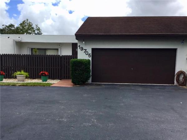 Royal Singapore Lake, 19705 W Lake Dr, Country Club, Florida 33015, image 1