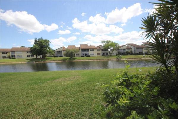 Azalea Court At Woodmont, 8770 Azalea Ct #101, Tamarac, Florida 33321, image 1