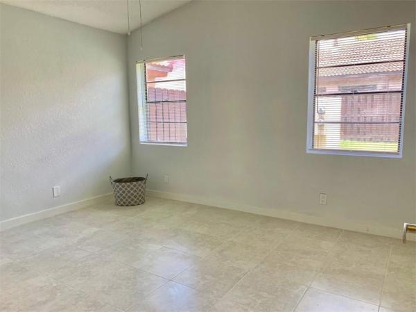 Villa Homes At The Moors, 6308 NW 170th Ter #6308, Country Club, Florida 33015, image 1