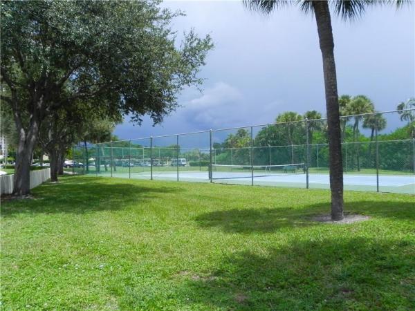 Garden Court Villas, 1823 Presidential Way #E101, West Palm Beach, Florida 33401, image 1