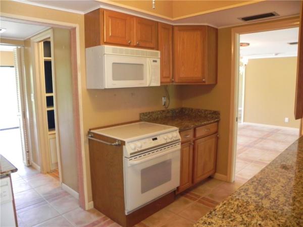 Garden Court Villas, 1823 Presidential Way #E101, West Palm Beach, Florida 33401, image 2