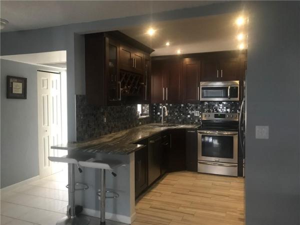 Baywood Village 1, 2516 Carambola Cir N #1811, Coconut Creek, Florida 33066, image 1