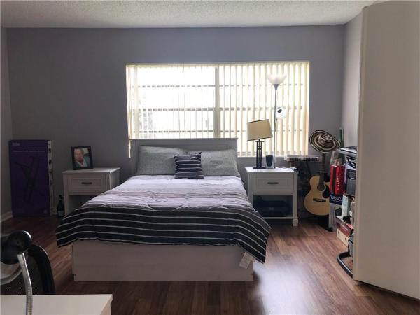 Holly Court At Woodmont, 8771 Holly Ct #102, Tamarac, Florida 33321, image 1