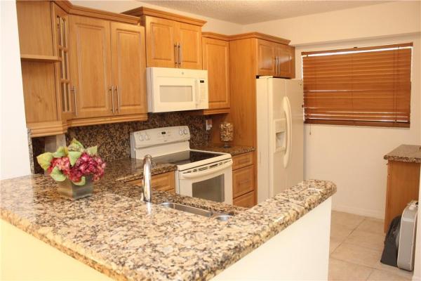 Bonaire At Woodmont, 7625 NW 79th Ave #103, Tamarac, Florida 33321, image 1