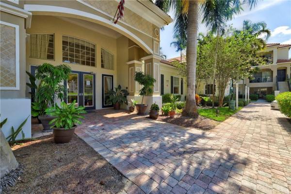 Poinciana Place, 5840 W Sample Rd #308, Lake Worth, Florida 33067, image 1