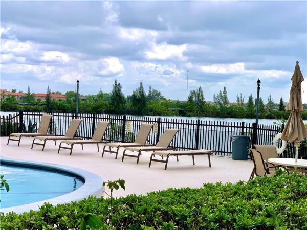 Quatraine, 20210 NE 3rd Ct #8, Ives Estates, Florida 33179, image 2
