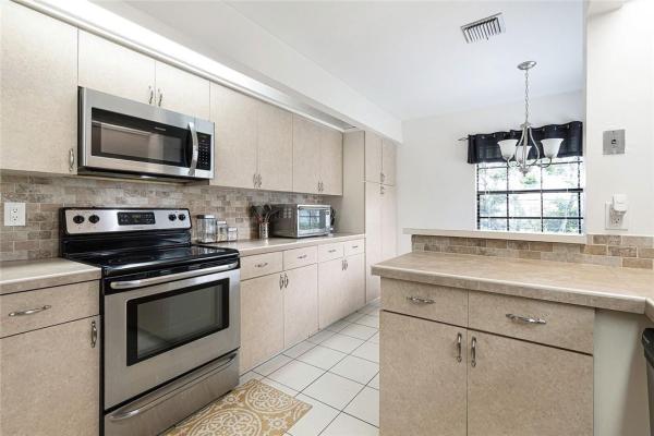 Waterford Isle At Woodmont, 8409 NW 78th Ct, Tamarac, Florida 33321, image 1