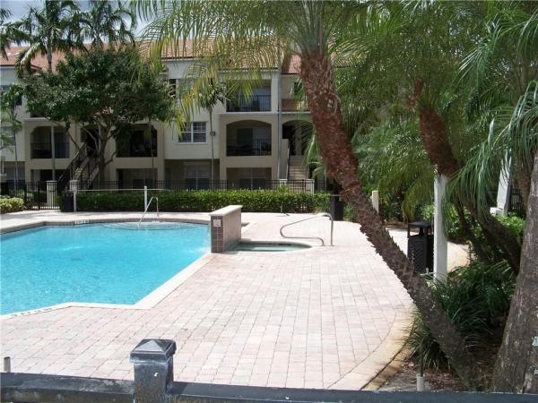 Poinciana Place, 5880 W Sample Rd #203, Lake Worth, Florida 33067, image 1