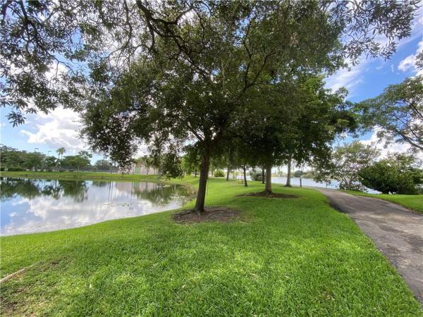 Whispering Lakes In Tamarac Hills, 4450 NW 17th Ave, Oakland Park, Florida 33309, image 1