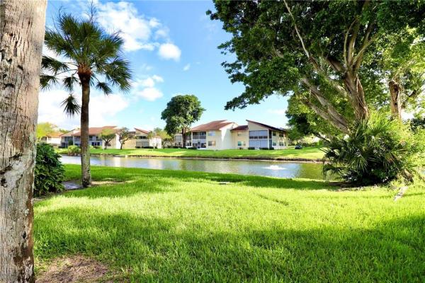 Azalea Court At Woodmont, 8780 Azalea Ct #204, Tamarac, Florida 33321, image 1